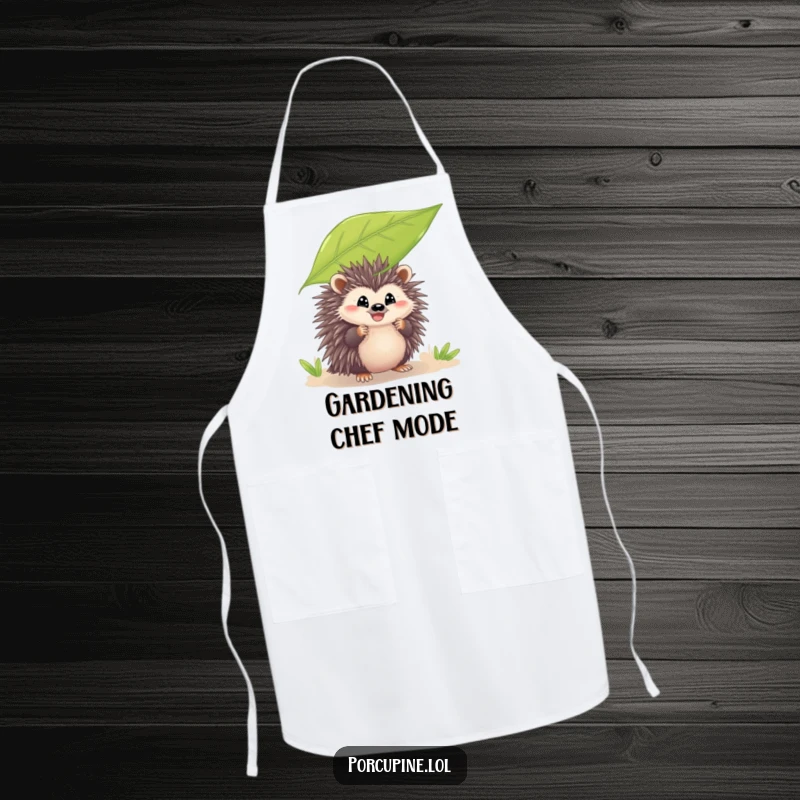 Funny apron featuring a porcupine peeking from behind a leaf with a grin, ideal for kitchen activities and adding a humorous, playful touch.