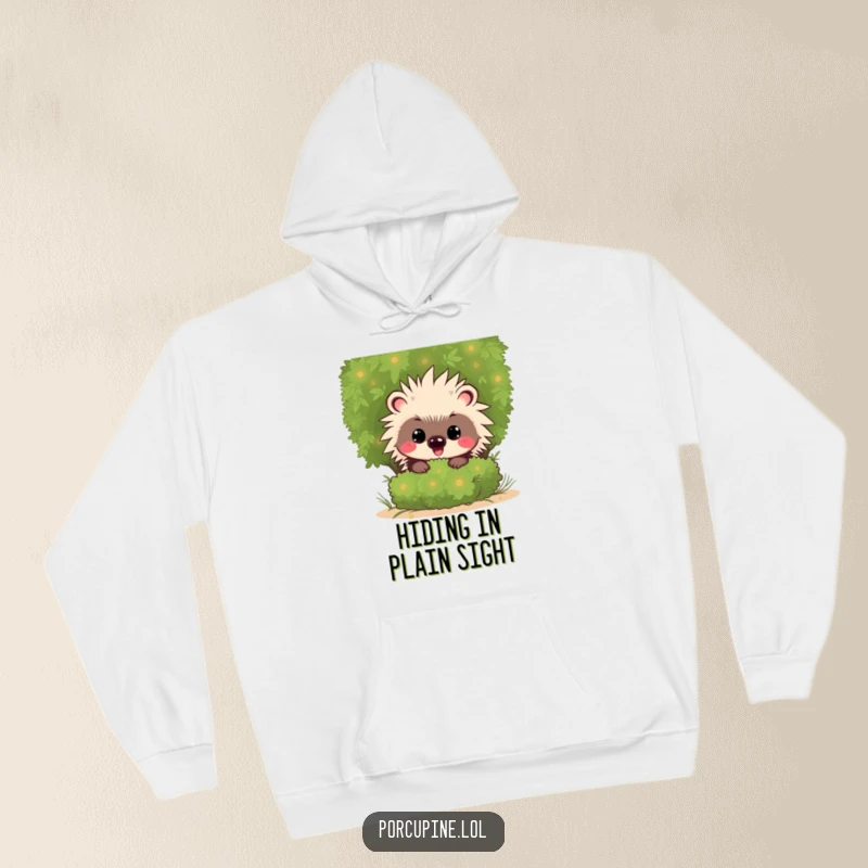 Funny Kawaii Porcupine Hoodie: Soft and warm hoodie featuring a cute cartoon porcupine with a mischievous grin, peeking from behind foliage.