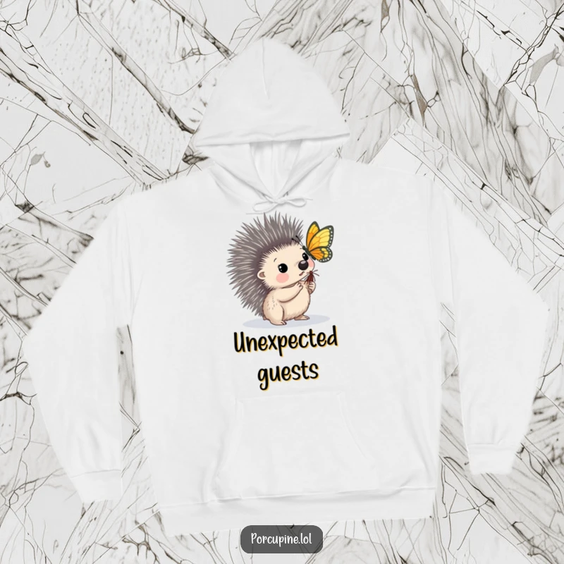 Funny hoodie showcasing a porcupine looking with fascination as a butterfly discovers a perch on its quill.