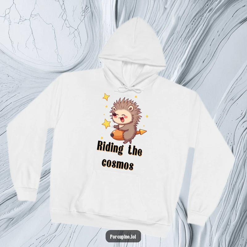 Funny Porcupine Hoodie: A porcupine giggling gleefully while riding a shooting star, designed for cozy, exhilarating fun.