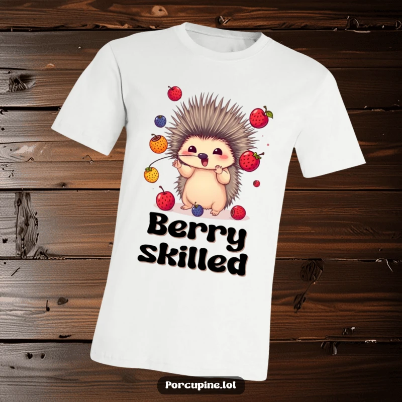 Funny t-shirt featuring a porcupine expertly juggling colorful berries with its quills, a visually engaging and humorous design.