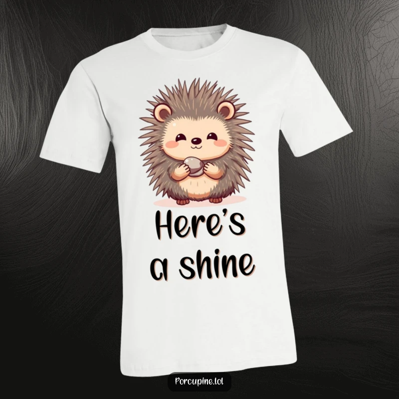 Funny t-shirt depicting a porcupine with a shy smile, offering a small, glistening pebble as a token of friendship.