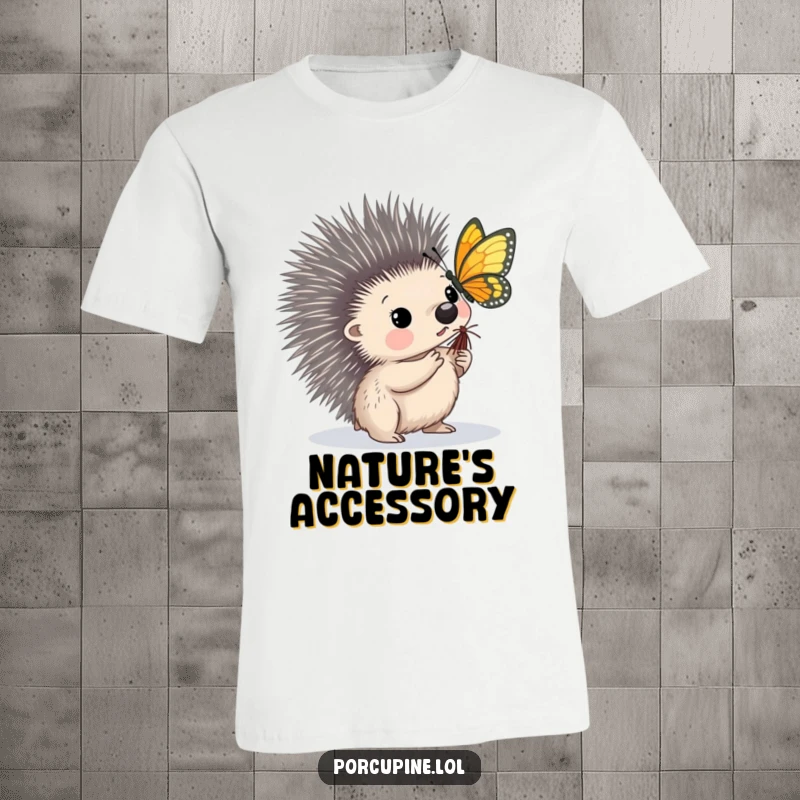 Funny t-shirt featuring a porcupine with wide, curious eyes watching a butterfly alight gently on its sharp quill.