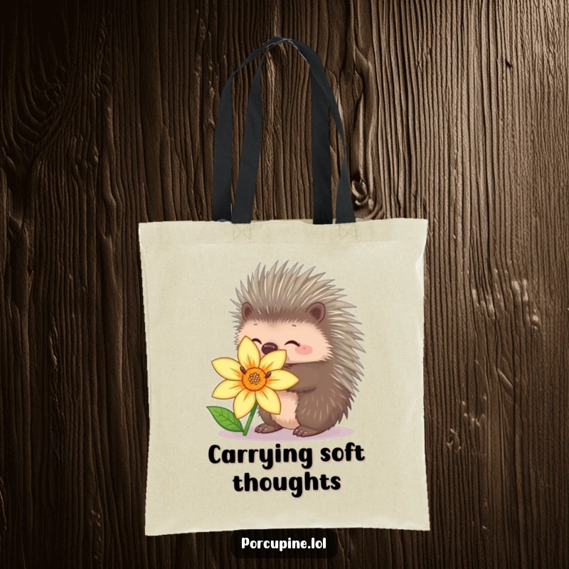Funny porcupine tote bag showing a porcupine with quills retracted, reaching for a flower hug, embodying sweet humor.