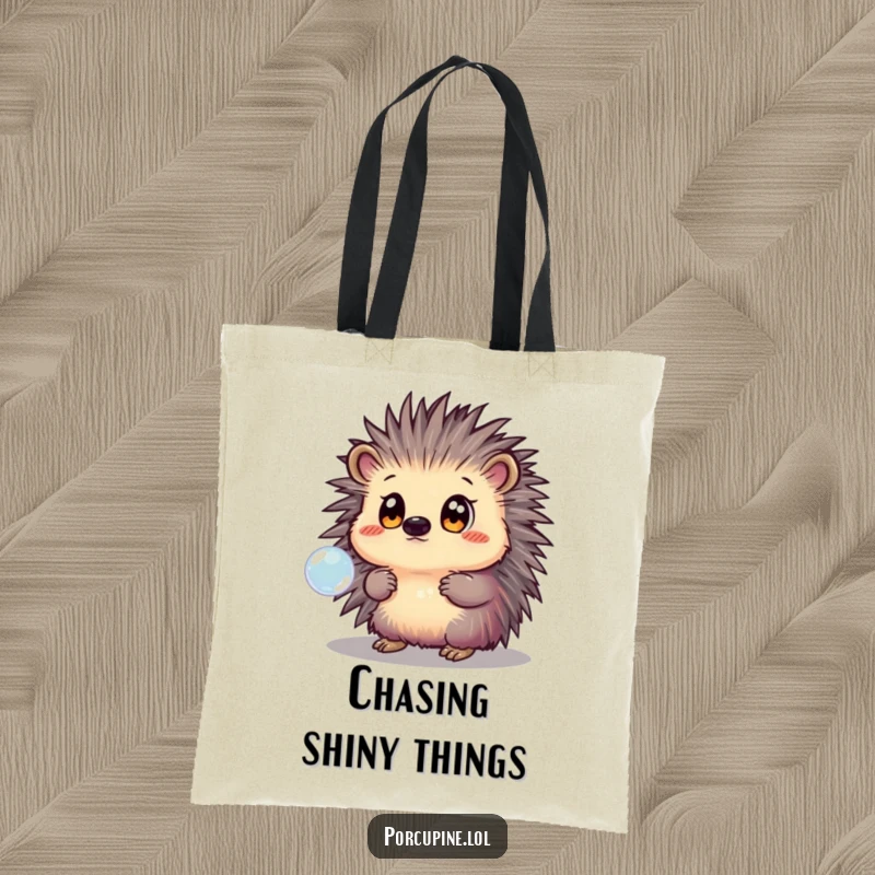 Funny Tote Bag featuring a porcupine with wide eyes, gazing in awe at a delicate, shimmering bubble floating in the air.